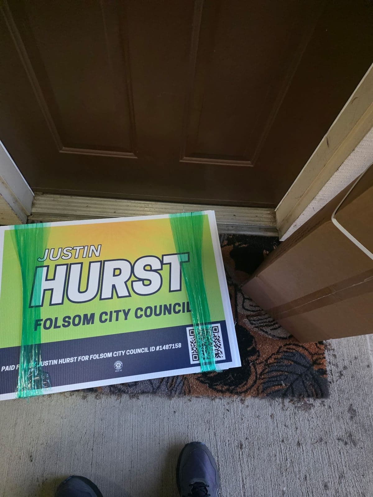 A Justin Hurst for Folsom City Council yard sign on a front porch